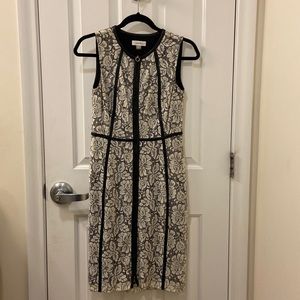 Calvin Klein Off-White & Black Lace, Faux Leather trim, zipper front dress.